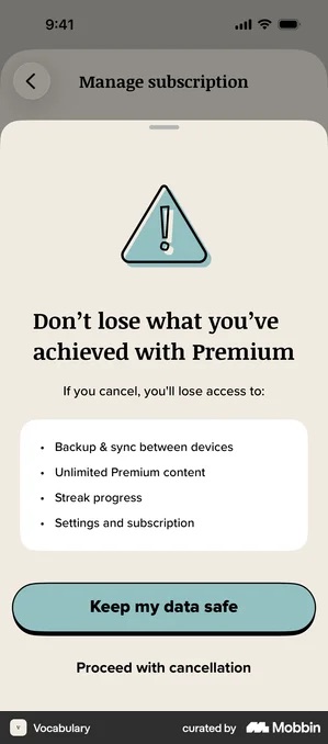 Vocabulary screen headed Don't lose what you've achieved with Premium, listing Backup and sync between devices, Unlimited Premium content, Streak progress, and Settings and subscription, with a filled Keep my data safe button and Proceed with cancellation as plain text